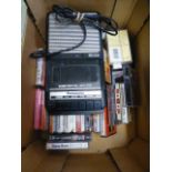 A box containing cassettes and a Panason