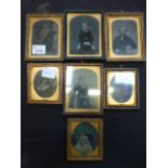 A collection of Victorian framed photogr