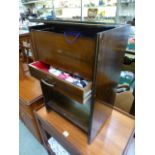 A mid-20th century sewing cabinet with d