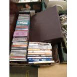 A tray containing DVD's and CD's by vari