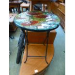 A glass topped folding occasional table