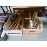 Two wooden storage boxes containing a ma