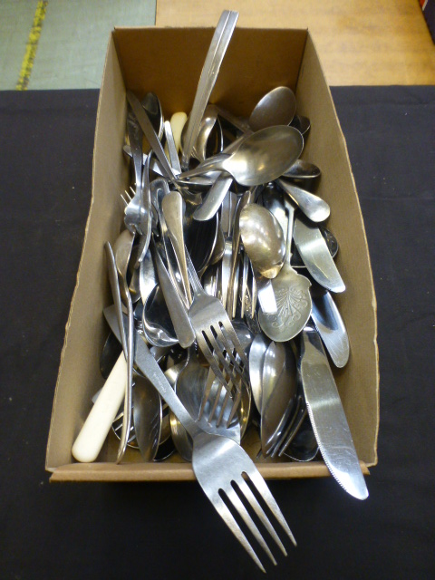 A box of assorted cutlery