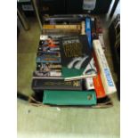 A box of hardback books by various autho