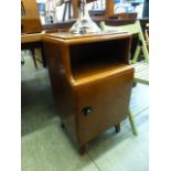 An early 20th century bedside cabinet