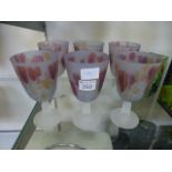 A set of six hand painted drinking glass