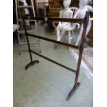 An early 19th century painted towel rail
