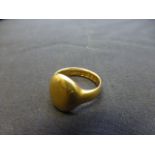 An 18ct gold signet ring approx weight 9