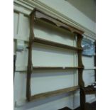 A set of pine wall hanging shelves