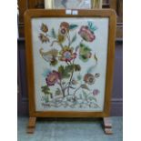 A beech framed fire screen with embroide
