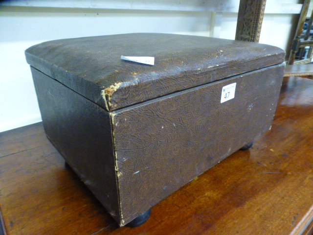 A 19th century oilskin box on bun feet