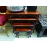 A nest of four mahogany occasional table
