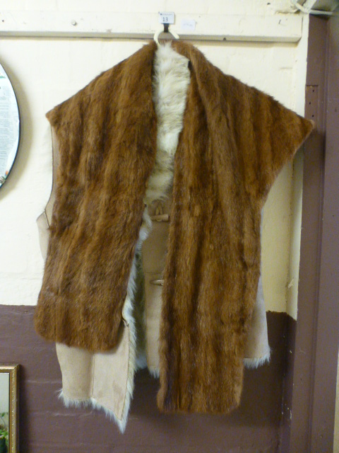A fur stole along with a fur lined waist