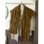 A fur stole along with a fur lined waist