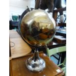 A gilt metal longitude and latitude glob