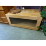 An oak effect television cabinet