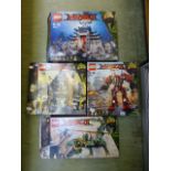 Four empty Lego Ninjago Movie boxes numb