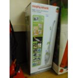 A boxed Morphy Richards steam cleaner