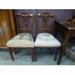 A pair of Edwardian bedroom chairs with