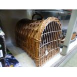 A wicker cat carrier