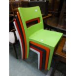 A set of five stacking Italian PVC chair