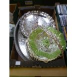 A tray containing silver plated serving