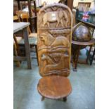 An African three-legged stool with carve