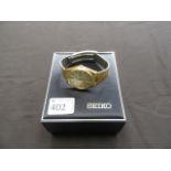 A gents Seiko quartz watch in box