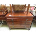 A mid-20th century mahogany chest of thr