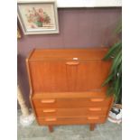 A mid-20th century teak bureau