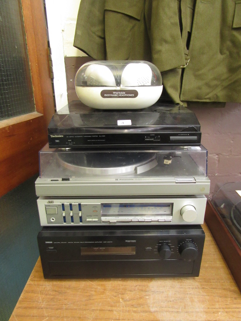 A Tecknics turntable together with a Pan