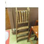 A set of old wooden step ladders