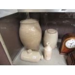 Three stoneware storage vessels together