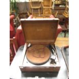 A mid-20th century travelling record pla