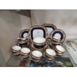 An Aynsley part tea set to include sugar