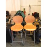 A pair of bentwood high chairs on chrome