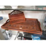 An eastern carved wood tray together wit