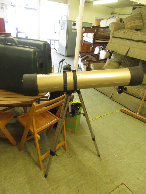 A Tasco telescope with tripod