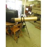 A Tasco telescope with tripod