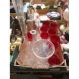 A tray of mixed glassware to include red