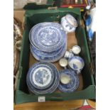 A tray of blue and white tableware to in