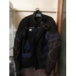 A blue and black motorcycle jacket