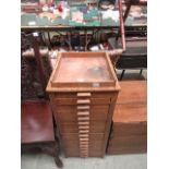 A multi-drawer mid-20th century chest by