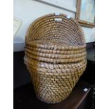 A wicker laundry basket in the form of a