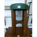 An early 20th century oak stool