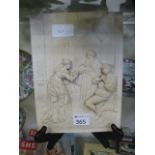 A relief moulded ceramic plaque depictin