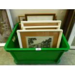 A box containing an assortment of prints