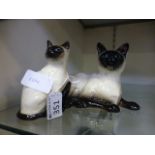Two Royal Doulton models of Siamese cats
