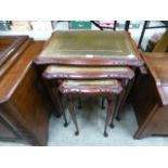 A reproduction nest of three tables, the