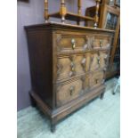 A 17th century style oak chest of two sh